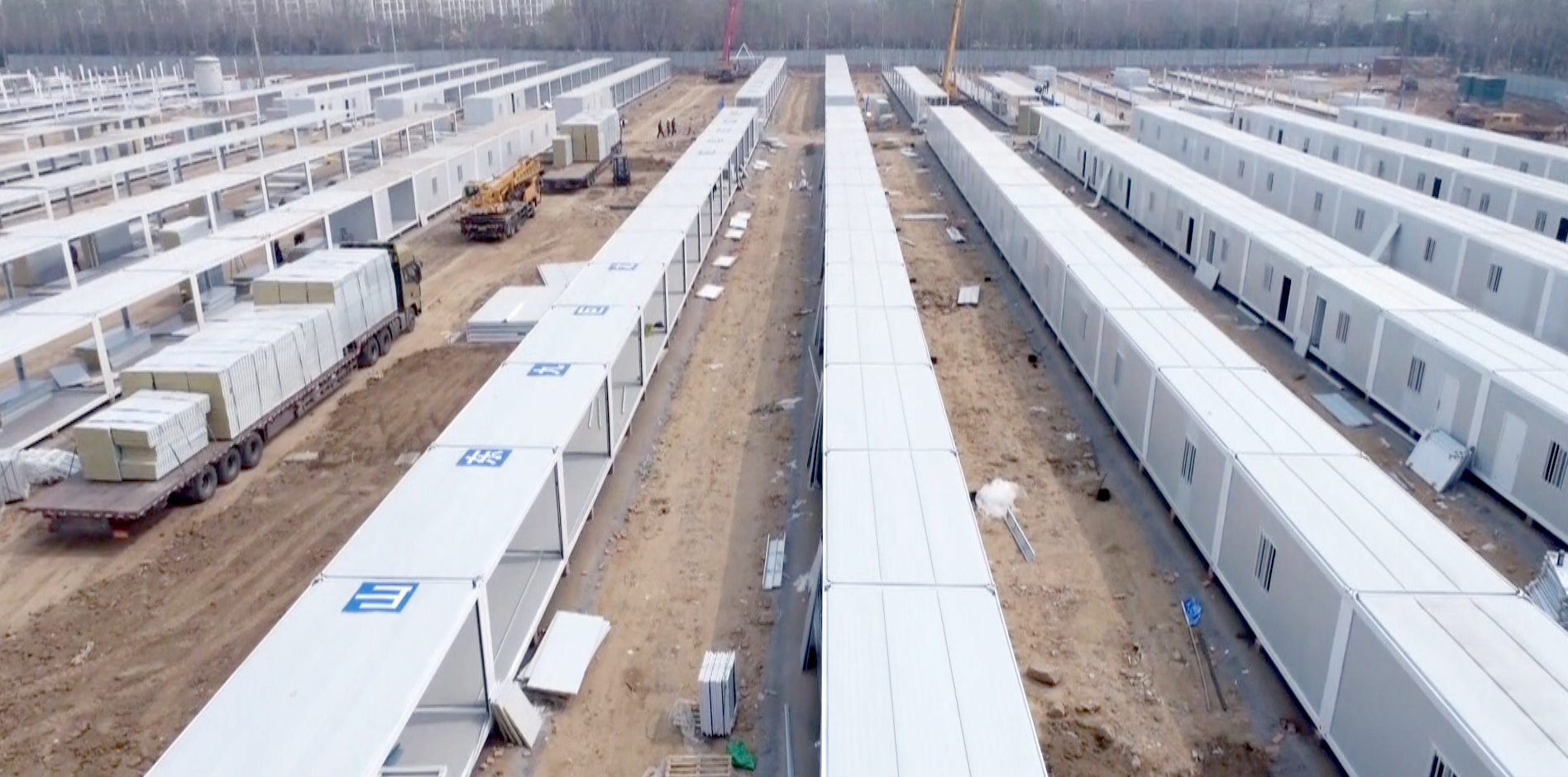 同心“抗疫”今年会垂危驰援建设梁山方舱隔离点建设